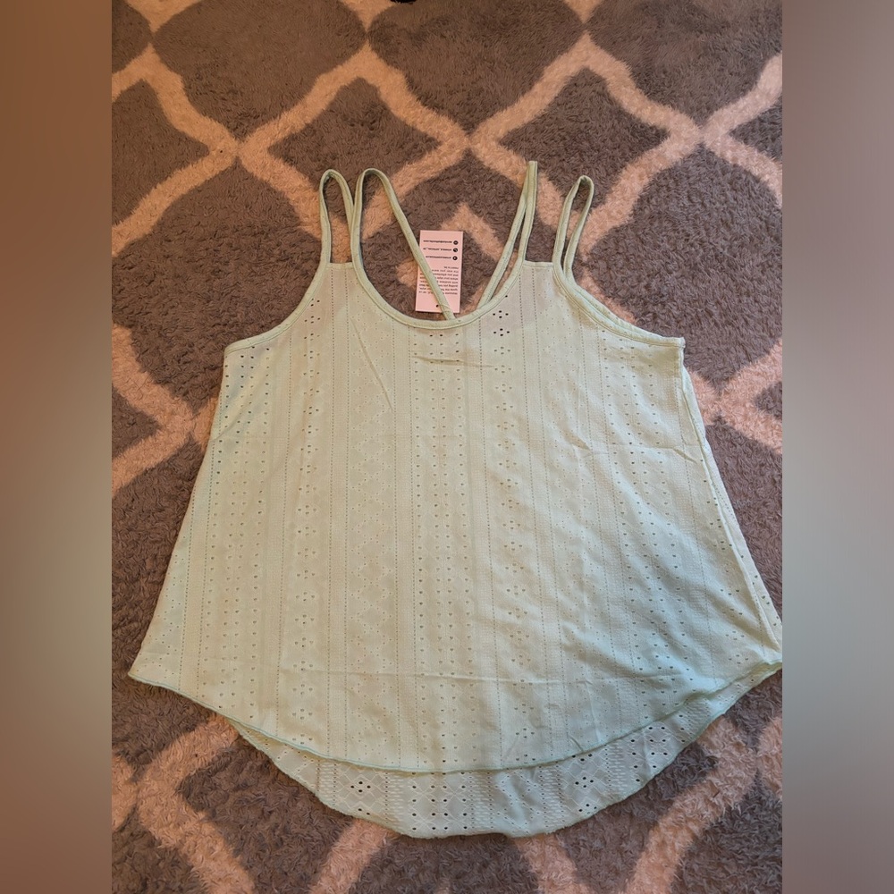 Woman’s mint green double strap tank top
